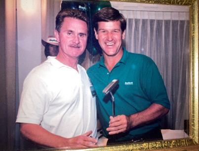 Bobby Orr and Sam after Sam won the long drive contest at the Bay Bank Open Golf Tournament.